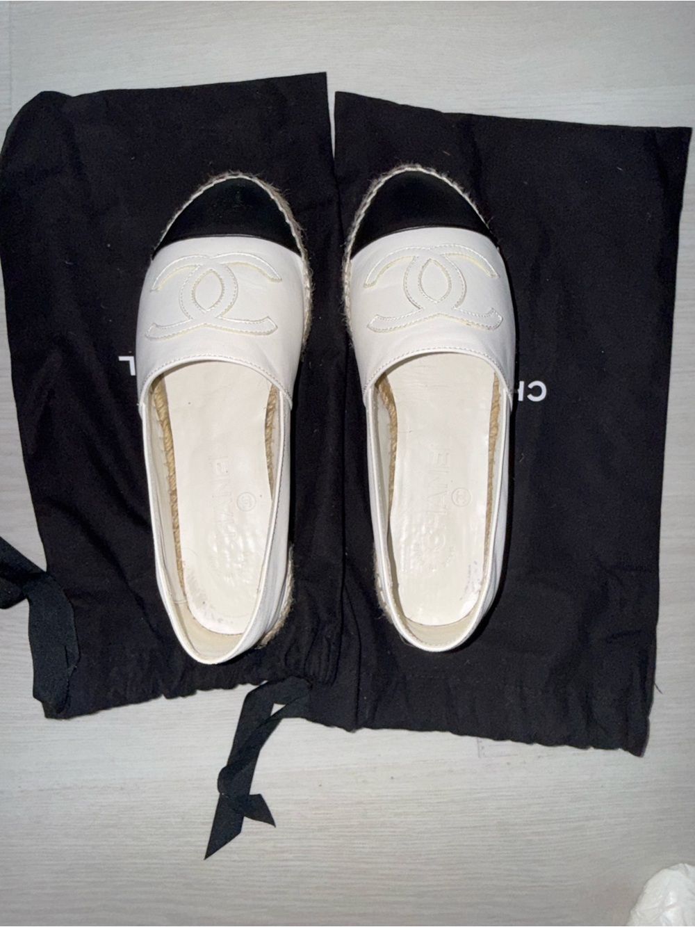 CHANEL Cream Espadrille Flats with Black Toe Cap